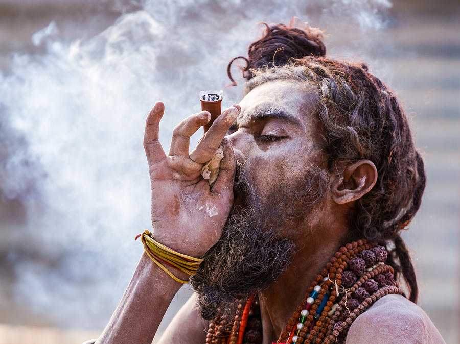 a-hindu-sadhu-smoking-a-hash-pipe-india-nila-newsom.jpg