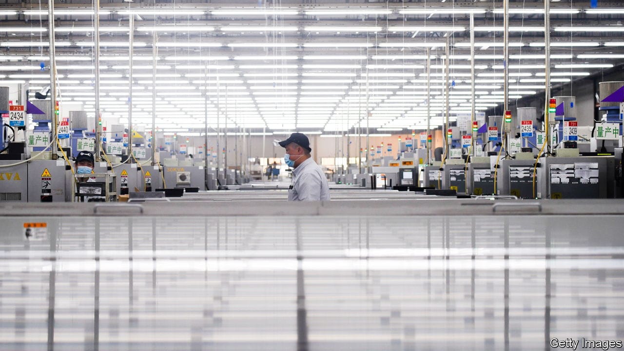 TOPSHOT - An employee wearing a face mask works at an SMC plant during a media tour organised by the government in Beijing on May 13, 2020, as the country's industrial sector starts again following shutdowns during the COVID-19 coronavirus outbreak. (Photo by WANG Zhao / AFP) (Photo by WANG ZHAO/AFP via Getty Images)'s industrial sector starts again following shutdowns during the COVID-19 coronavirus outbreak. (Photo by WANG Zhao / AFP) (Photo by WANG ZHAO/AFP via Getty Images)