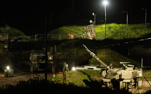 IDF Artillery Corps and an Iron Dome air defense system are seen near the border with Lebanon, in northern Israel, April 6, 2023. (Ayal Margolin/Flash90)