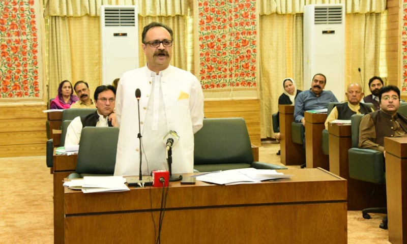 Azad Jammu and Kashmir Prime Minister Sardar Tanveer Ilyas addresses the legislative assembly on Thursday. — Photo by author