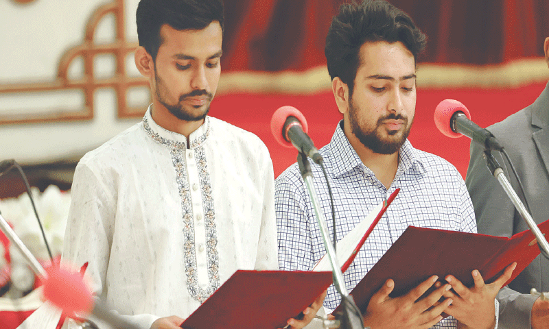 Asif Mahmud (left) and Nahid Islam, the student leaders who led the movement against Sheikh Hasina, take oath as advisers in the newly formed interim government, at Dhaka’s Bangabhaban.—Reuters