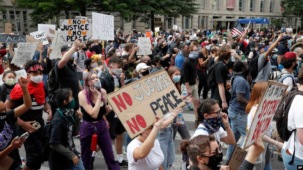 FILE - Demonstrators protest the death of George Floyd on June 2, 2020, near the White House in Washington. New research ranks the United States among the 50 most conflict-ridden nations in 2023.