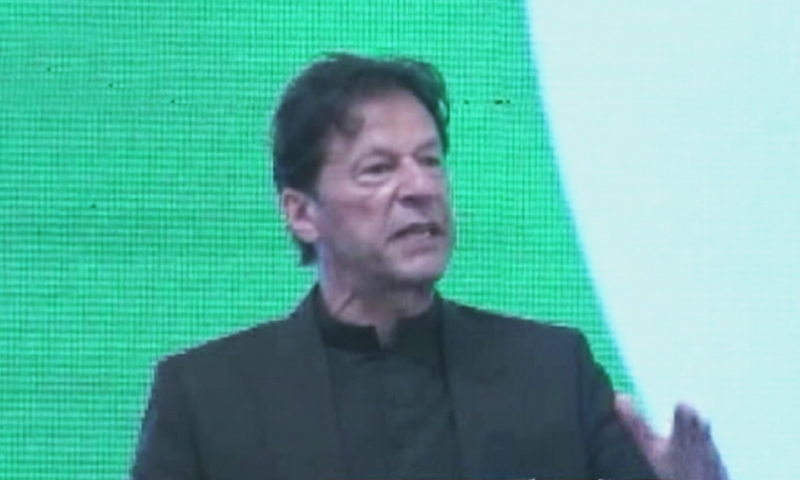 Prime Minister Imran Khan addresses a cheque distribution ceremony. — DawnNewsTV