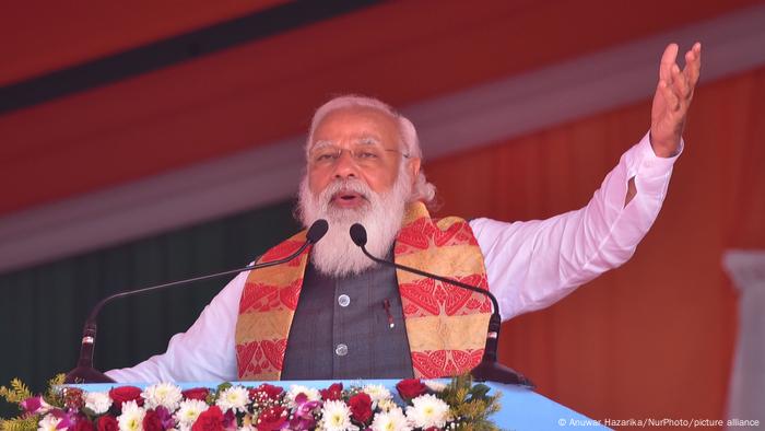 Indian PM Narendra Modi gestures during a speech