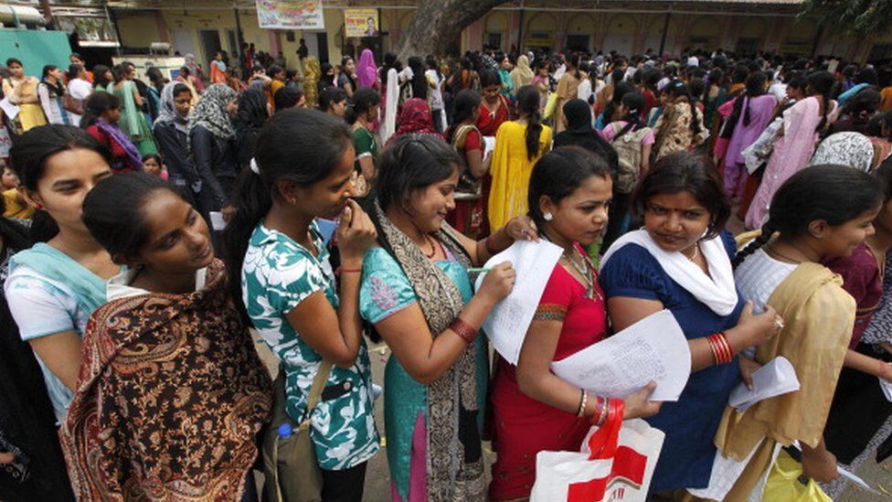 A crowd waits to get their names registered at at Lal Bagh Employment Office on March 13, 2012 in Lucknow, India