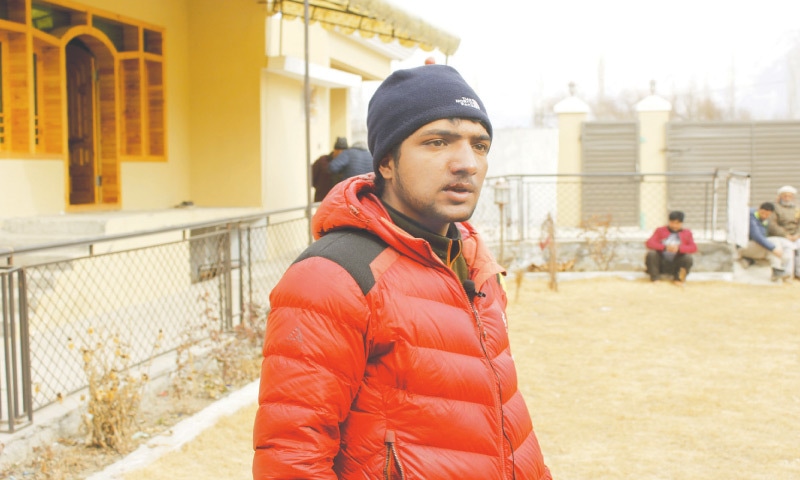 Skardu: Sajid Ali Sadpara, son of missing mountain climber Ali Sadpara, talks to local journalists at his house. Sajid had begun to climb K2, but was forced to abandon the summit attempt after his equipment failed.—AP