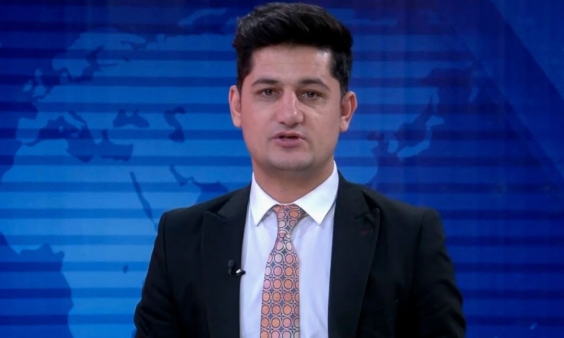 In this undated handout screengrab, TV journalist Nemat Rawan is seen during a news broadcast of ToloNews channel. — AFP/TOLOnews