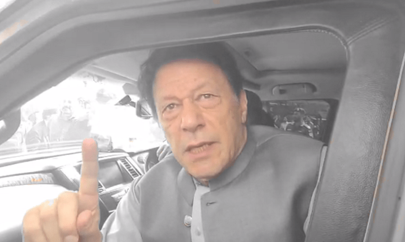 <p>PTI Chairman Imran Khan talking to media as he appears in LHC on March 25. — Screengrab from video by Rana Bilal</p>