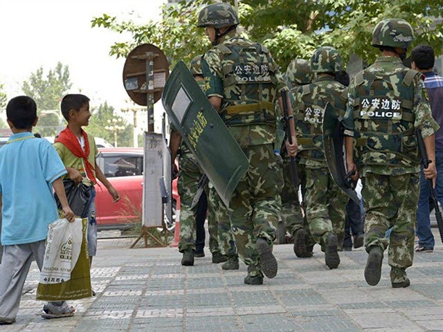 chinese-police-patrol-terrorism-xinjiang-ap.jpg