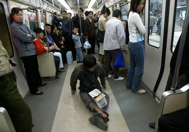 china-poor-beggar-beijing-subway.jpg