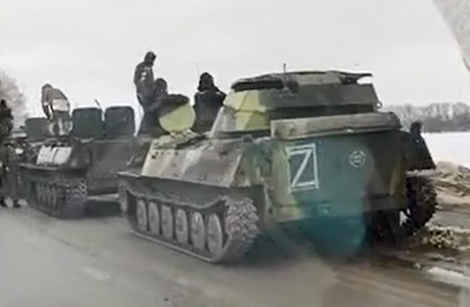 Russian armoured tanks painted with a letter 'Z' and huge convoys are moving towards the Ukraine border. It is suspected the markings have been allocated for specific roles amid rising tensions over an imminent invasion - as shelling rocked the east of the country