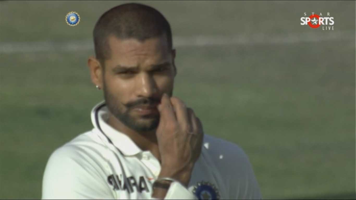 Shikhar-Dhawan-adujest-his-mustache-after-day3-stumps.jpg