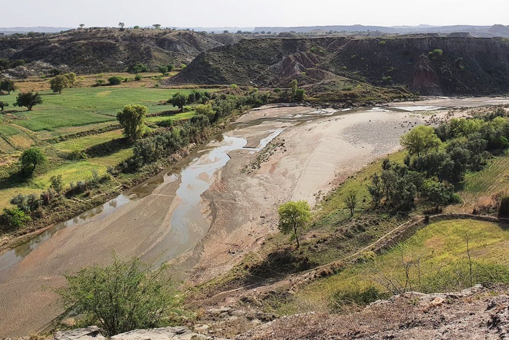 The river close to Bela, looking across to the echoing hill