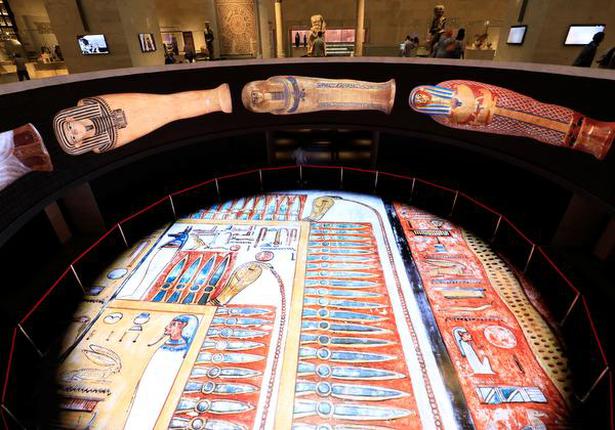 A large display of mummies at the National Museum of Egyptian Civilization in Cairo.