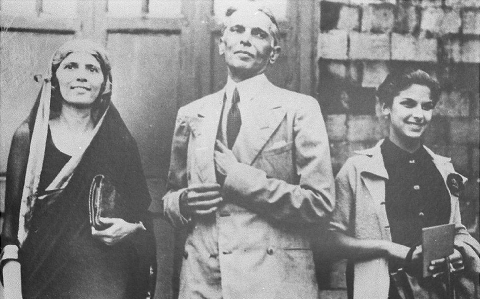 A black and white picture of a young Dina Wadia, shot at an undisclosed location with her father Mohammad Ali Jinnah, the founder of Pakistan, and aunt Fatima Jinnah