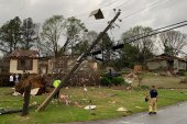 First responders survey damage in Pelham, Alabama after an enormous Tornado swept through the area [Screengrab via Pelham Police Dept Twitter]