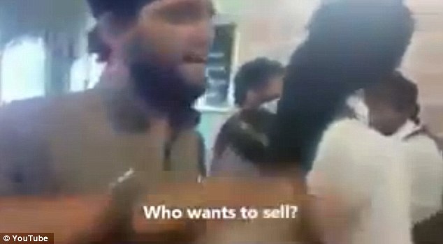 1415018434748_wps_11_Isis_slave_market_video_g.jpg