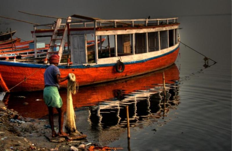 fish-catcher-on-the-shore-of-the-Ganges-River.jpg