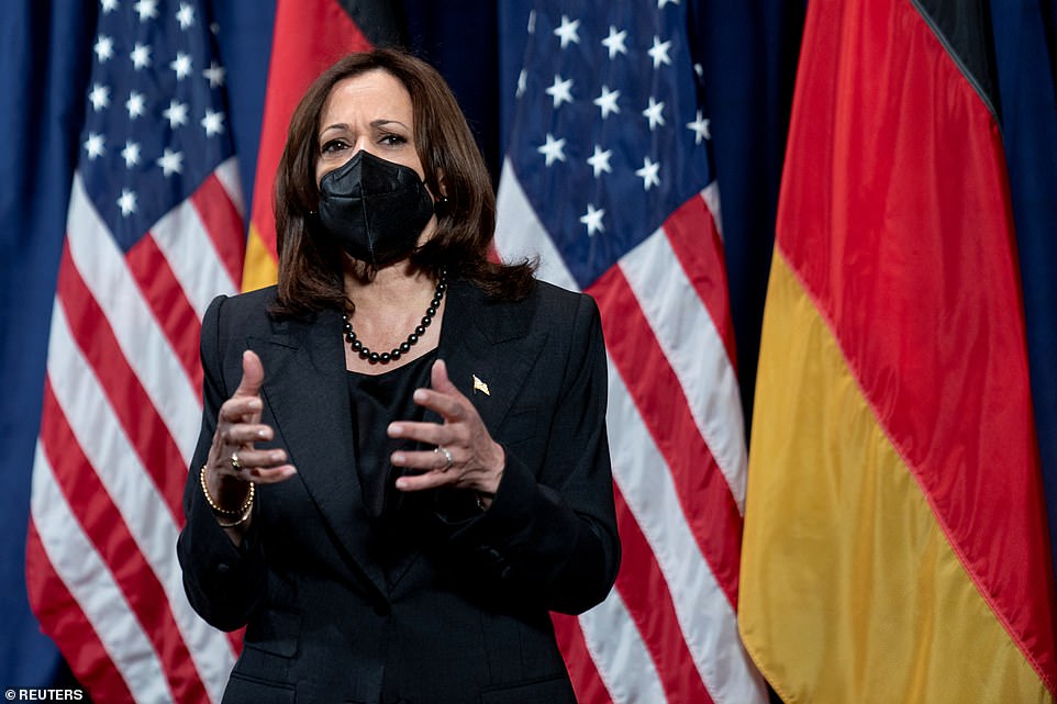 US Vice President Kamala Harris speaks to the media following an appearance at the Munich Security Conference on Sunday. She warned the US would impose 'some of the greatest, if not strongest' sanctions 'ever issued'