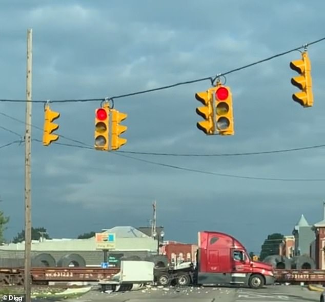 The impact separated the cab from its trailer, with the cab driver pulling to the side following the impact