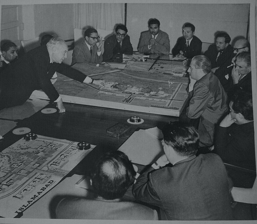  A group photo of CDA team and Architects. Gerard is sitting second from right on top. — Photo provided by author from Gerard Brigden’s archives 