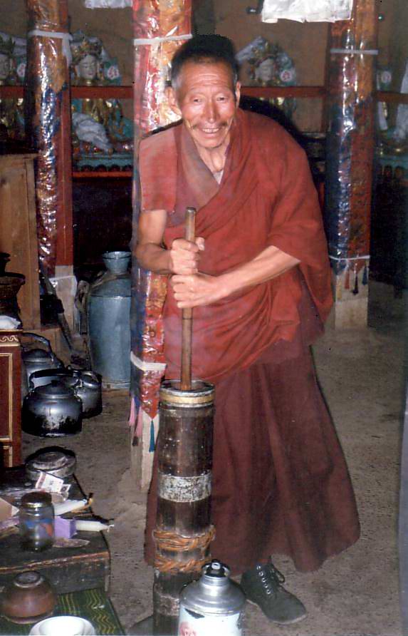 Monk_churning_butter_tea.JPG