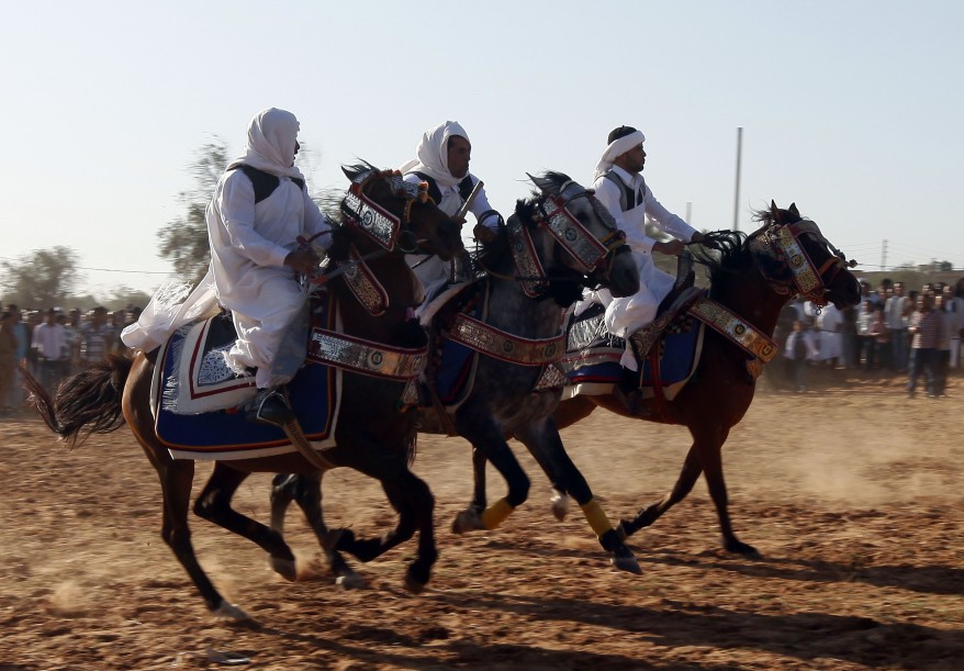 reuters_libya_horsemen_26Apr12-878x611.jpg