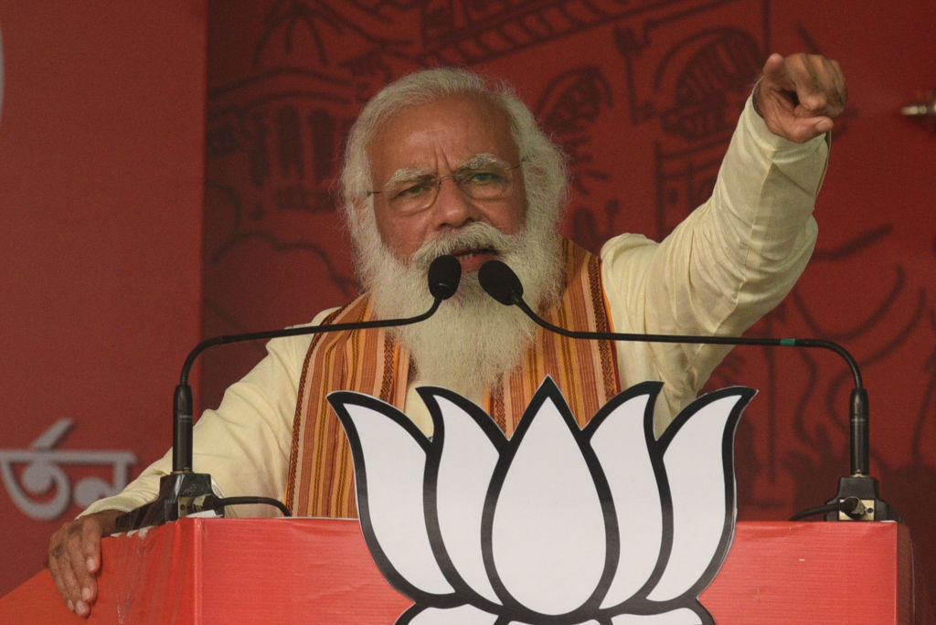 Prime Minister Narendra Modi addresses a public rally for the West Bengal Assembly Election on April 12, 2021 in the North 24 Parganas district, India. (Samir Jana/Hindustan Times via Getty Images)