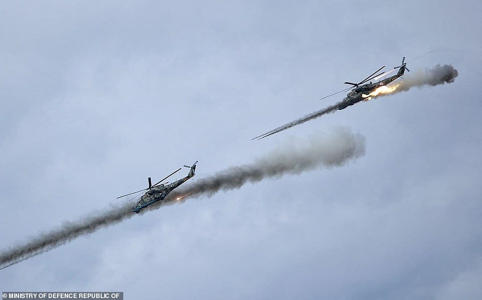 The Kremlin insists it has no incursion plans, but its test-firing of nuclear-capable missiles Saturday did little to alleviate tensions. Russia has also been holding joint exercises with Belarus at a firing range near Brest (pictured)