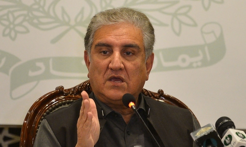 Foreign Minister Shah Mahmood Qureshi gestures while addressing the members of the media in Islamabad on February 25. — AFP