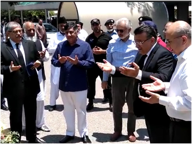 sc judges pray together after planting trees on june 2 2023 photo screengrab