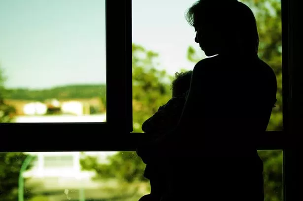 1_Woman-and-son-at-window.jpg