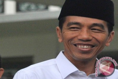 20160801joko-Widodo-berpeci.jpg