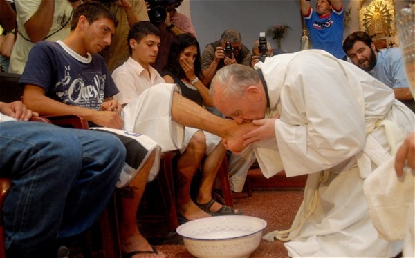 PopeFrancis-washing-feet-young-people-.jpg