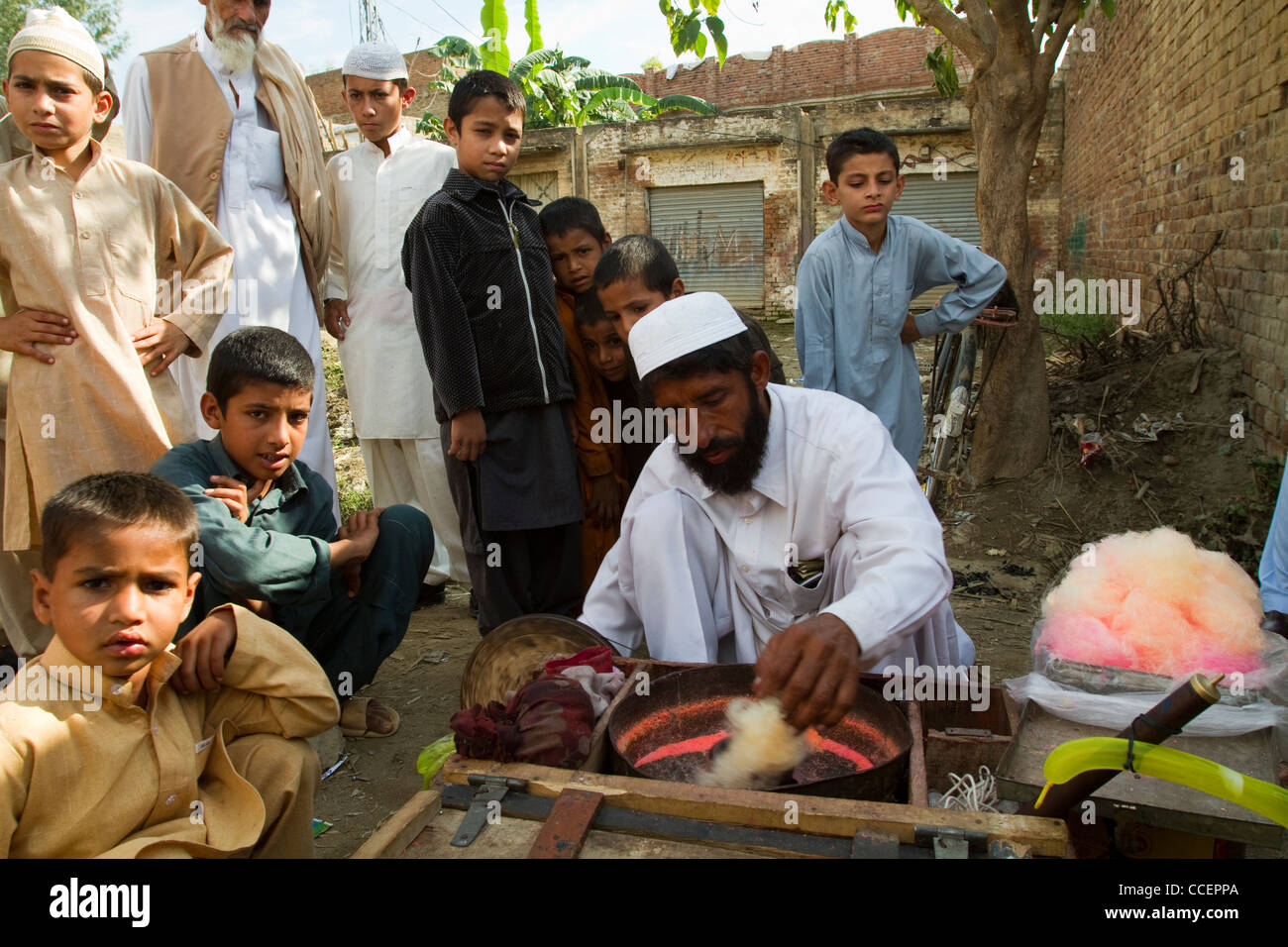 street-vendor-selling-cotton-candy-charsadda-pakistan-CCEPPA.jpg