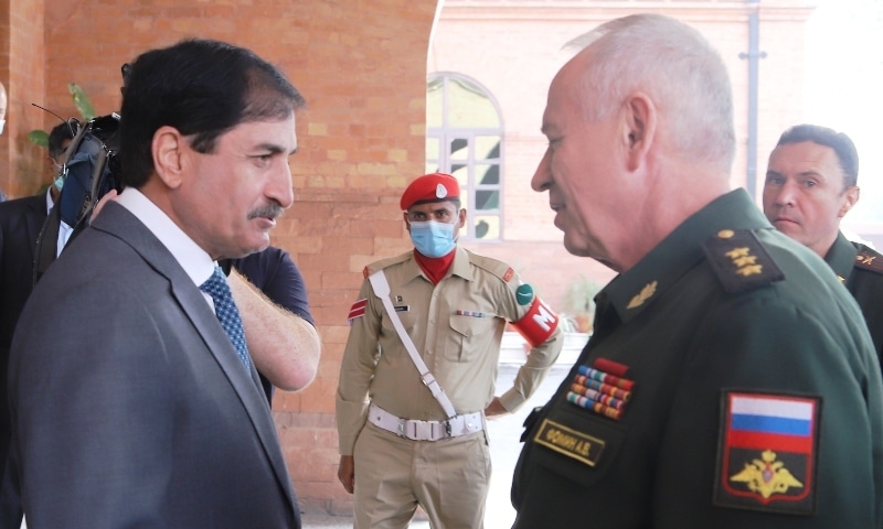 Defence Secretary retired Lt Gen Mian Mohammad Hilal Hussain (left) shakes hands with  Russian Deputy Defence Minister Col Gen Alexander V. Fomin at the Ministry of Defence on September 29. — Photo courtesy: PID