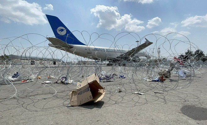 a commercial airplane is seen at the hamid karzai international airport a day after u s troops withdrawal in kabul afghanistan august 31 2021 photo reuters