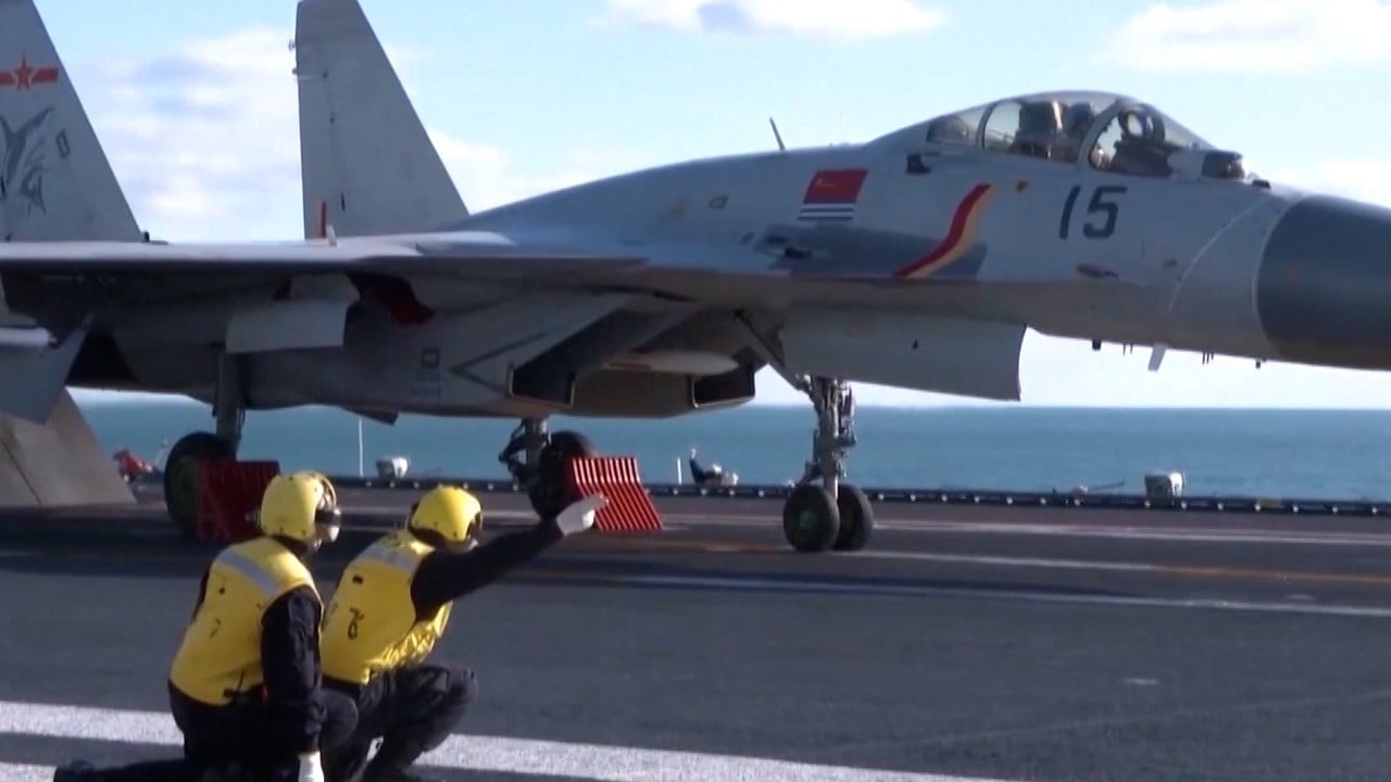 Chinese PLA Navy crew on the aircraft carrier Liaoning conduct training exercises