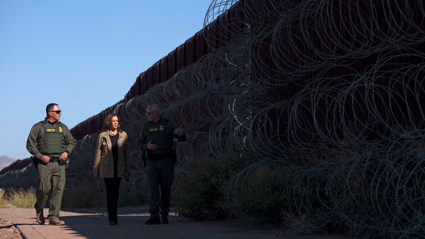 US Vice President and Democratic presidential candidate Kamala Harris visits the US-Mexico border with US Border Patrol Tucson Sector Chief John Modlin, right, in Douglas, Arizona, on September 27, 2024.