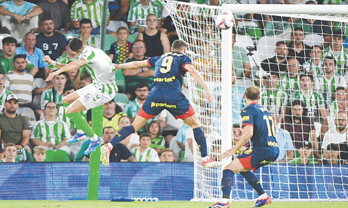 Girona fight back to share points with Betis in season opener