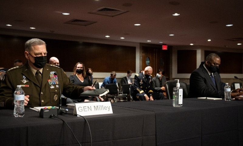 Chairman of the Joint Chiefs of Staff General Mark Milley and US Defence Secretary Lloyd Austin prepare to testify during a Senate Armed Services Committee hearing on Capitol Hill on September 28. — Reuters