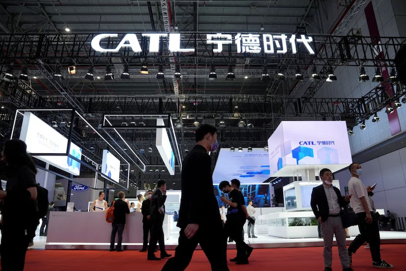 People walk past the booth of the battery manufacturer Contemporary Amperex Technology Co. Limited (CATL) at the Auto Shanghai show, in Shanghai, China April 18, 2023. REUTERS/Aly Song/File Photo Acquire Licensing Rights