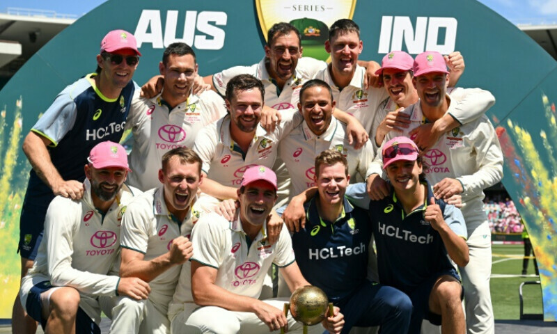 Australia players celebrate with the Trophy after winning the fifth Test and the series 3-1 against India on Jan 5. — AFP