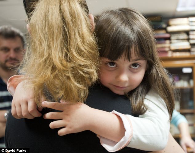 Effects of austerity: Juliana Tsivra with her mother Maria. Maria used to work in a bakery but lost her job more than a year ago