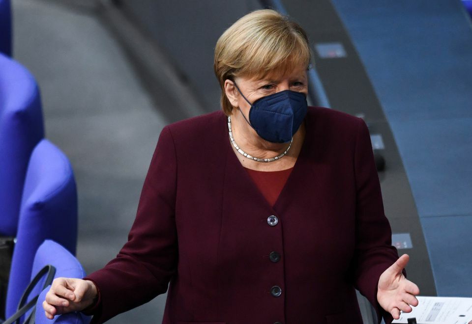 Germany's acting Chancellor Angela Merkel gestures as she attends a session of the German lower house of Parliament, Bundestag in Berlin, Germany, November 11. — Reuters