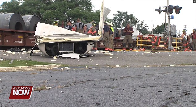 Scenes from the aftermath shot by local news stations appear to show part of the trailer landing upside down as authorities investigated the incident Monday night