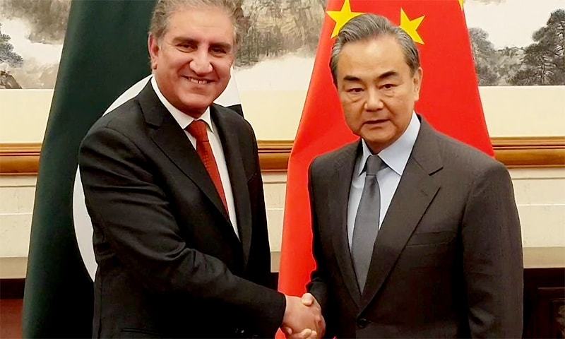 Foreign Minister Shah Mehmood Qureshi and his Chinese counterpart Wang Yi. — Dr Mohammad Faisal/Twitter