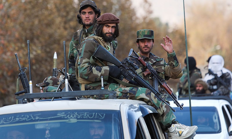 Members of Taliban sit on a military vehicle during a military parade in Kabul, Afghanistan, on  November 14, 2021. — Reuters