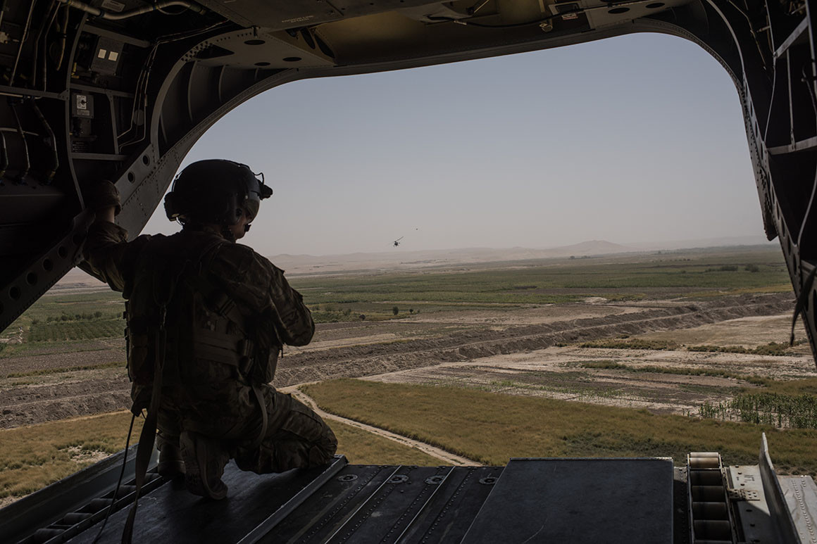 A U.S. Army helicopter flies from Camp Shorab to Camp Bost in 2017 in Helmand Province, Afghanistan. 