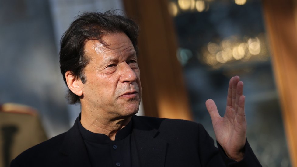 Pakistan prime minister Imran Khan (L) and Afghanistan president Ashraf Ghani, (not seen) talk with journalists during a joint press conference in Kabul, Afghanistan, 19 November 2020.